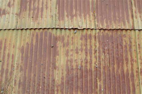 treat rusted galvanized metal roof